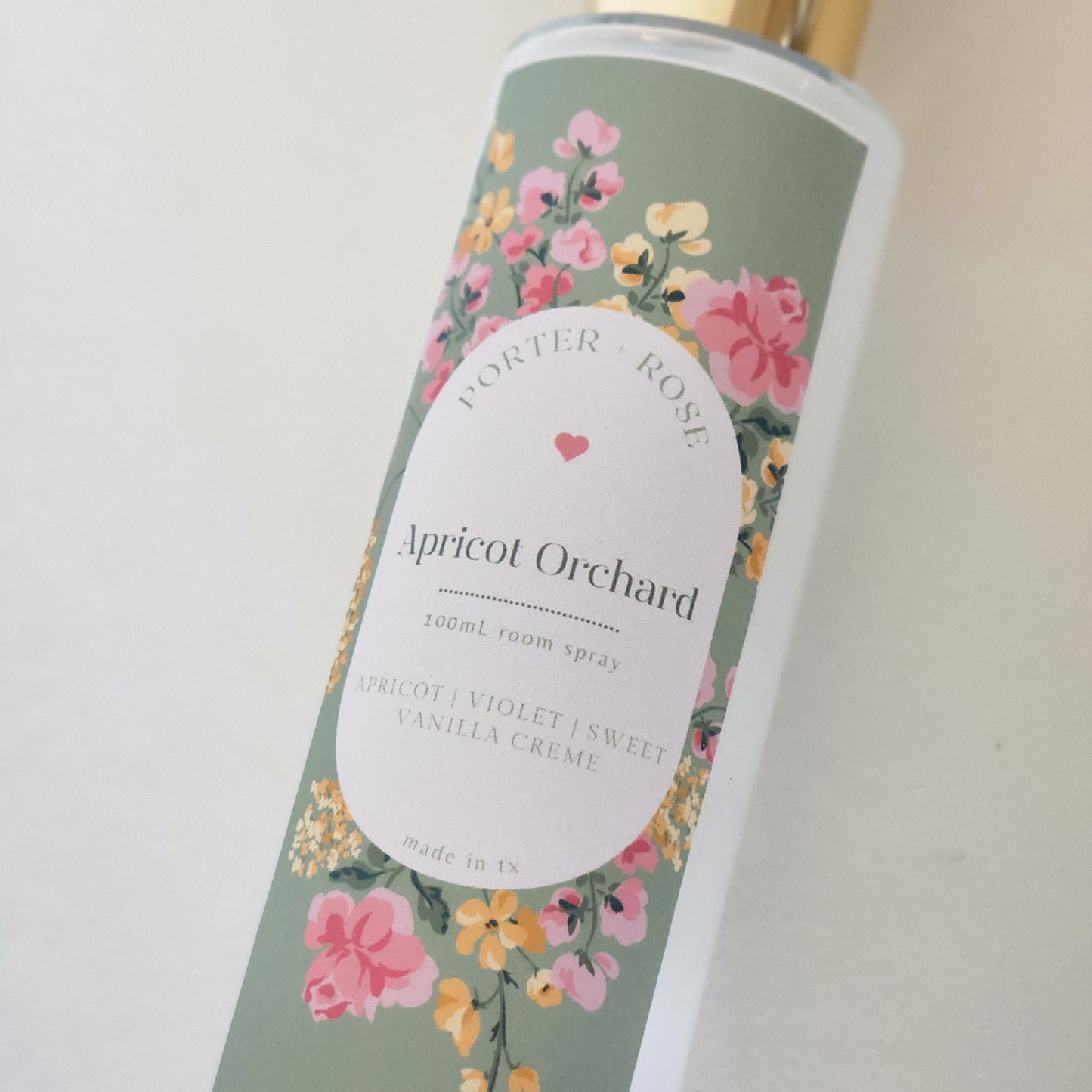 Apricot Orchard - sleek 100ml glass bottle with gold rim filled with light white spring scented room spray