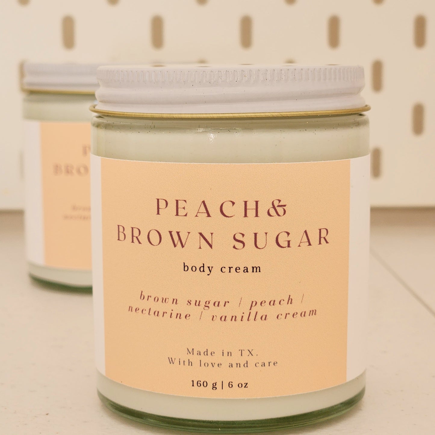 peach brown sugar body cream in heavy glass jar with white lid, 160g made in texas