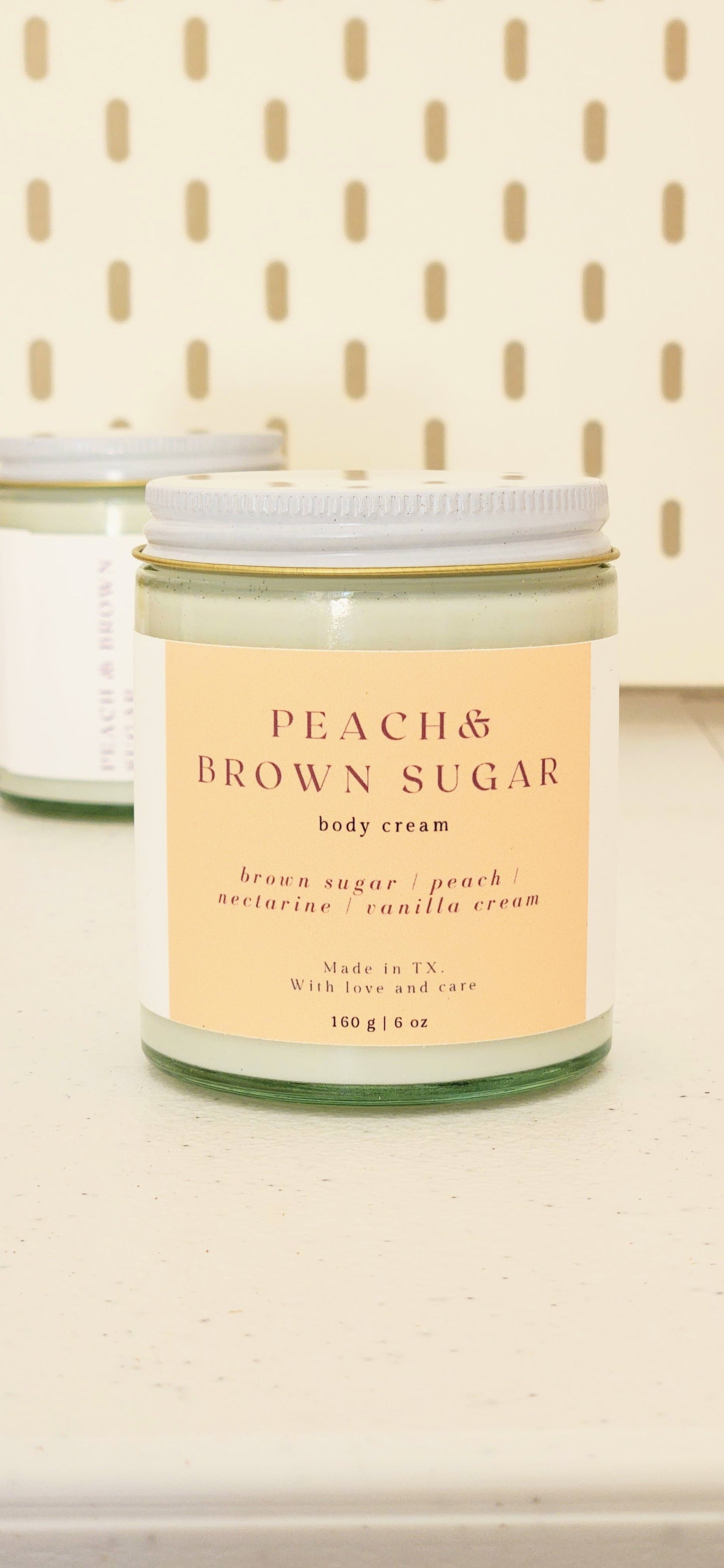 peach brown sugar body cream in heavy glass jar with white lid, 160g made in texas