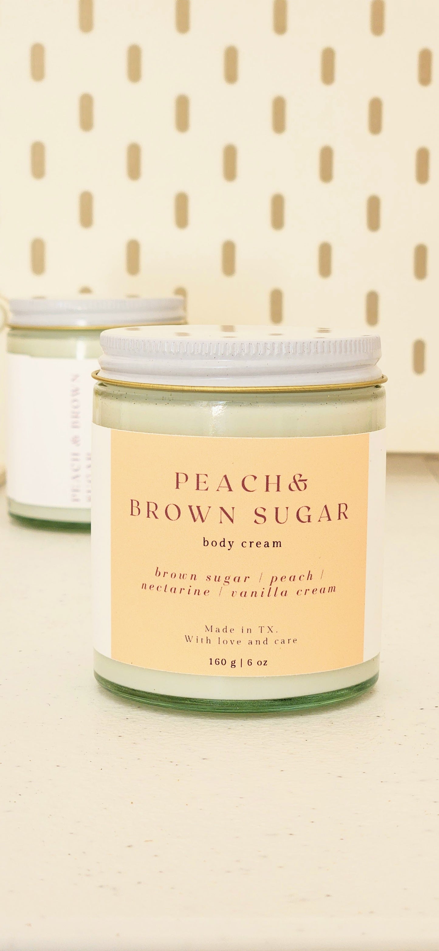 peach brown sugar body cream in heavy glass jar with white lid, 160g made in texas