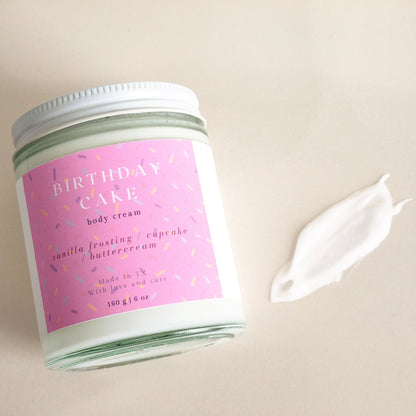 birthday cake body cream in clear glass heavy bottomed jar, 160g - sprinkle label pink - porter + rose