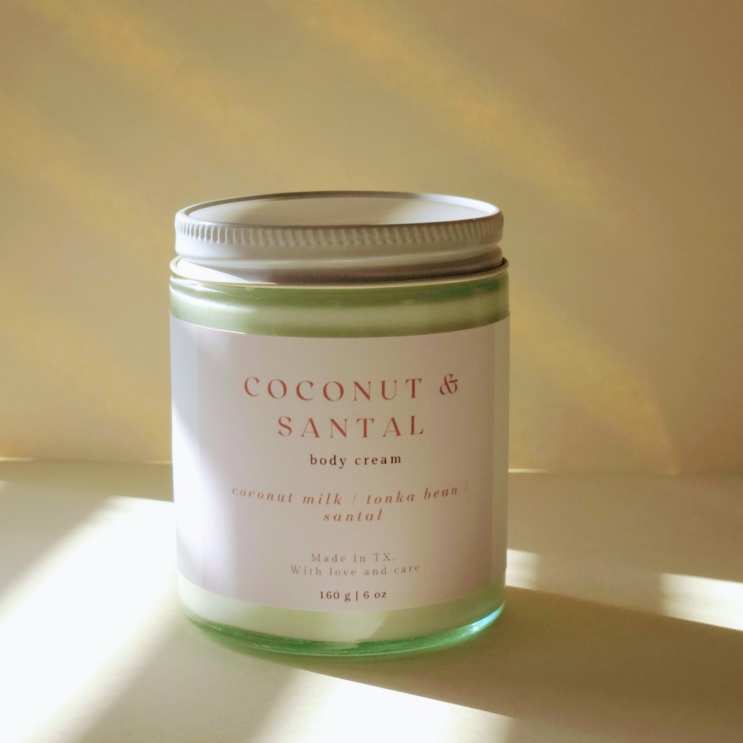 coconut and santal scented body cream for dry, itchy skin. in glass jar 6oz