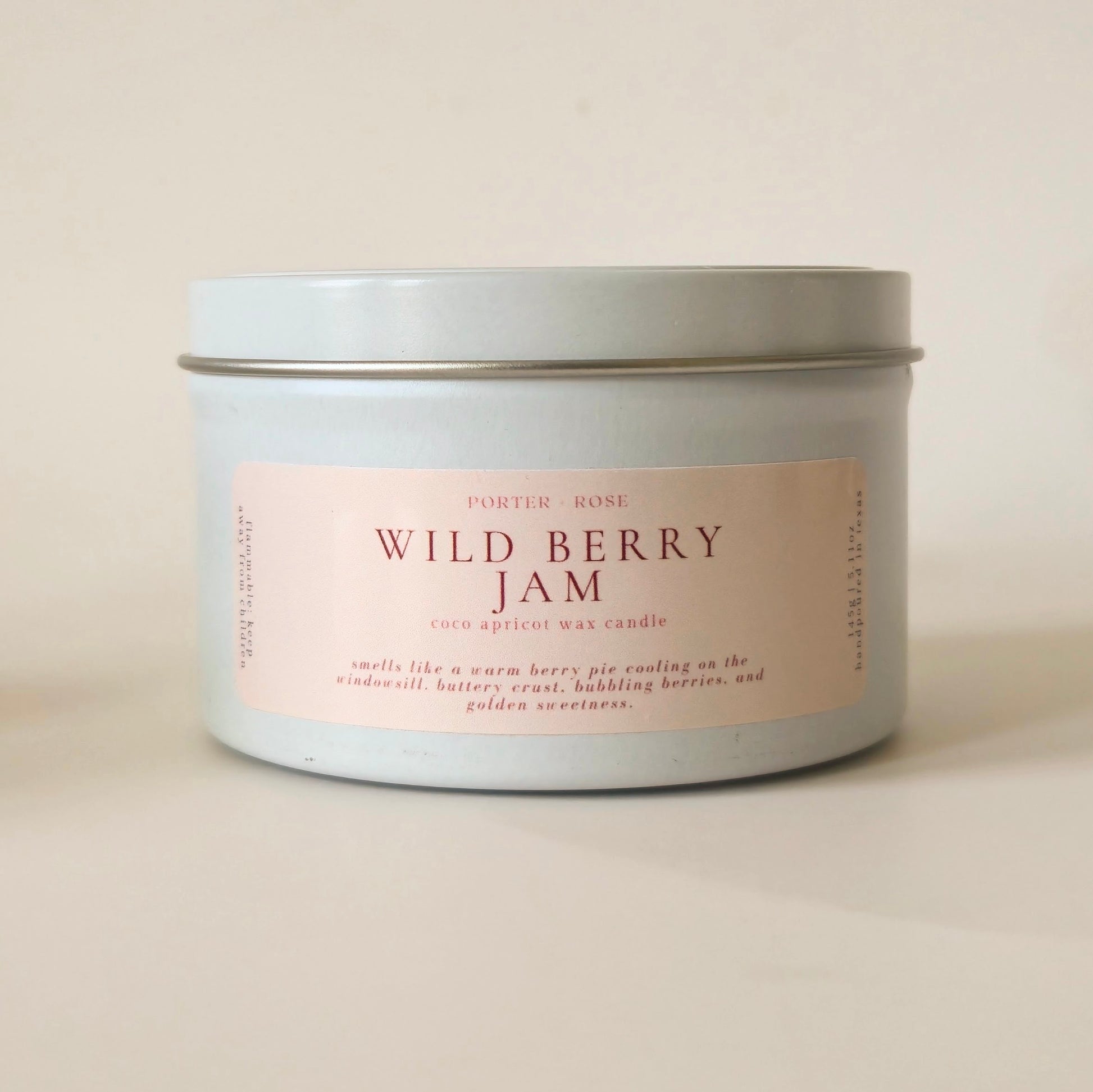 Wild Berry Jam wooden wick candle in a 5oz white tin jar on a clean white background.