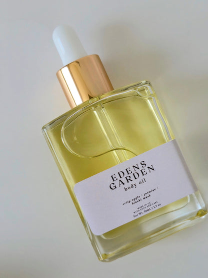 Eden's Garden body oil bottle on a light background