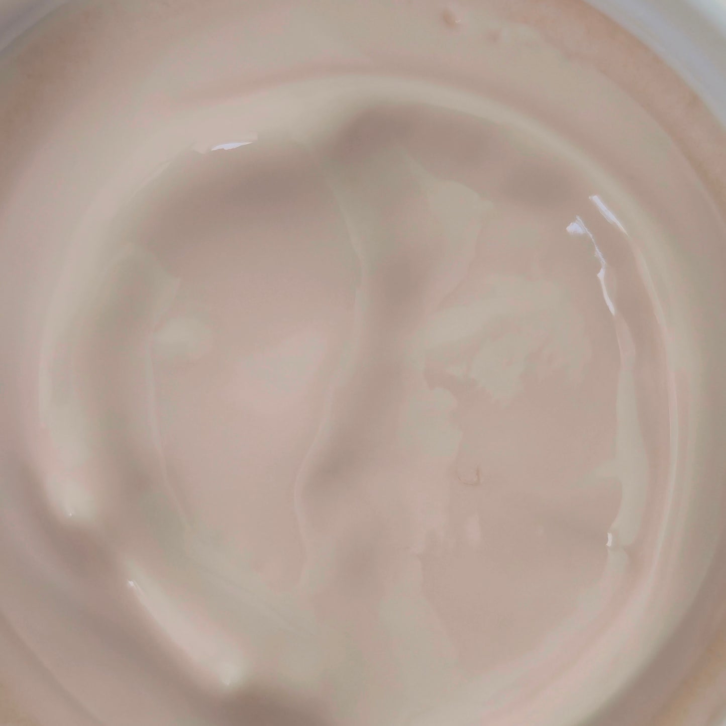 Texture shot of moisturizing body cream made with murumuru butter for winter skin care