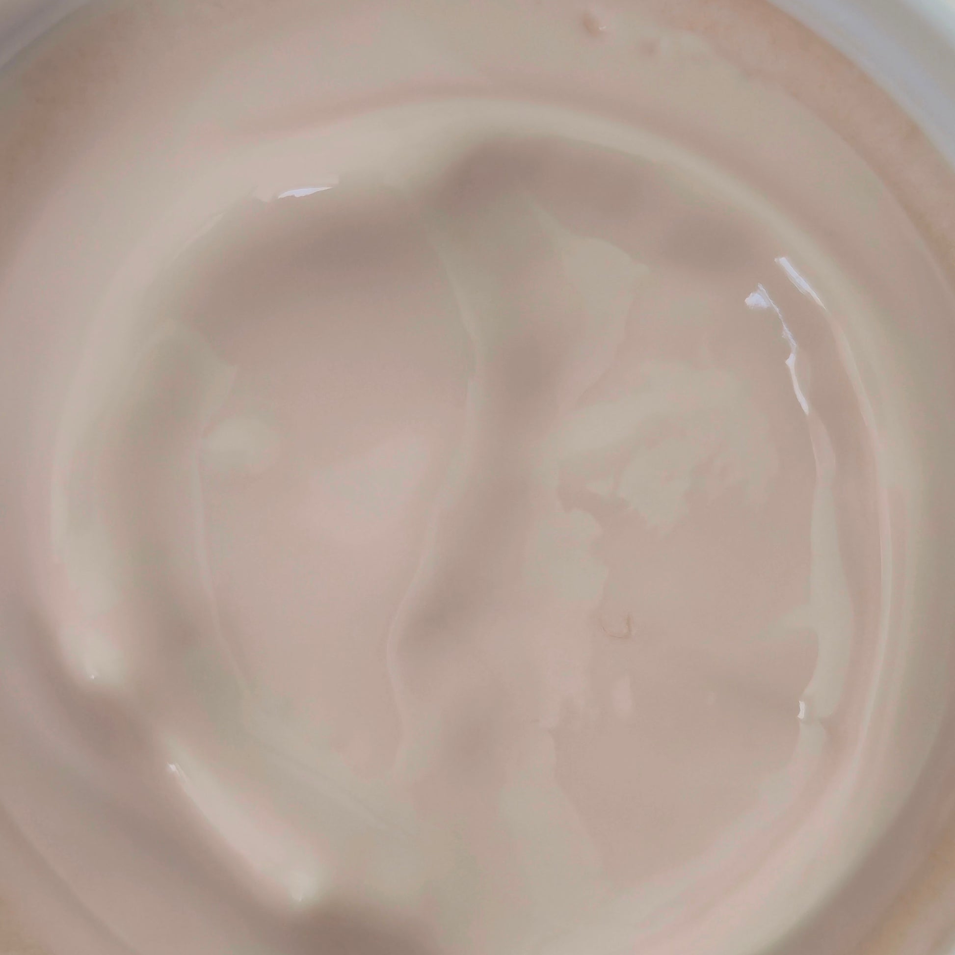 Texture shot of moisturizing body cream made with murumuru butter for winter skin care