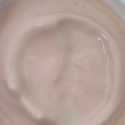 Texture shot of moisturizing body cream made with murumuru butter for winter skin care