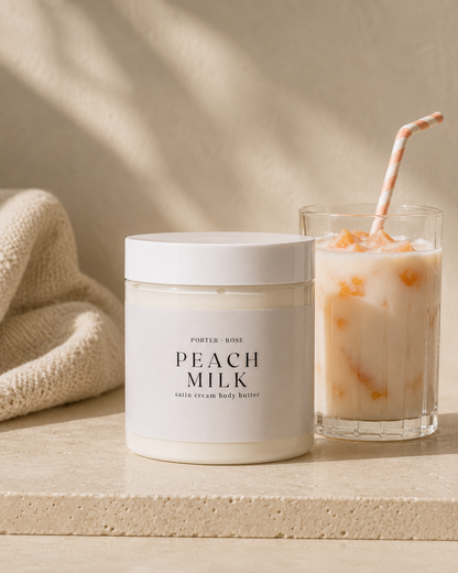 jar of peach milk body butter for dry skin - peach milk shake on stone riser