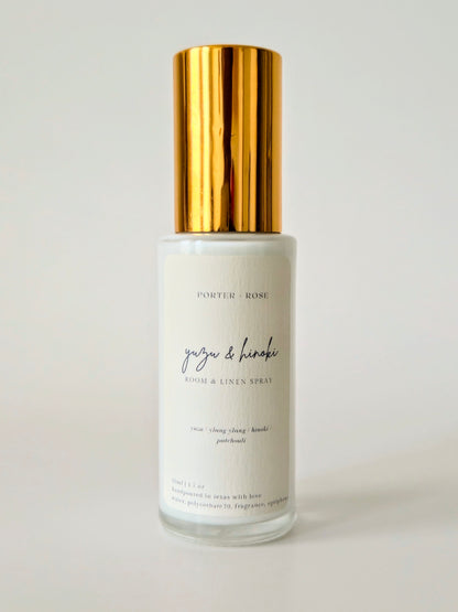 Close-up of Yuzu & Hinoki spray bottle showing natural ingredients label